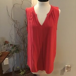 Red V-neck sleeveless top